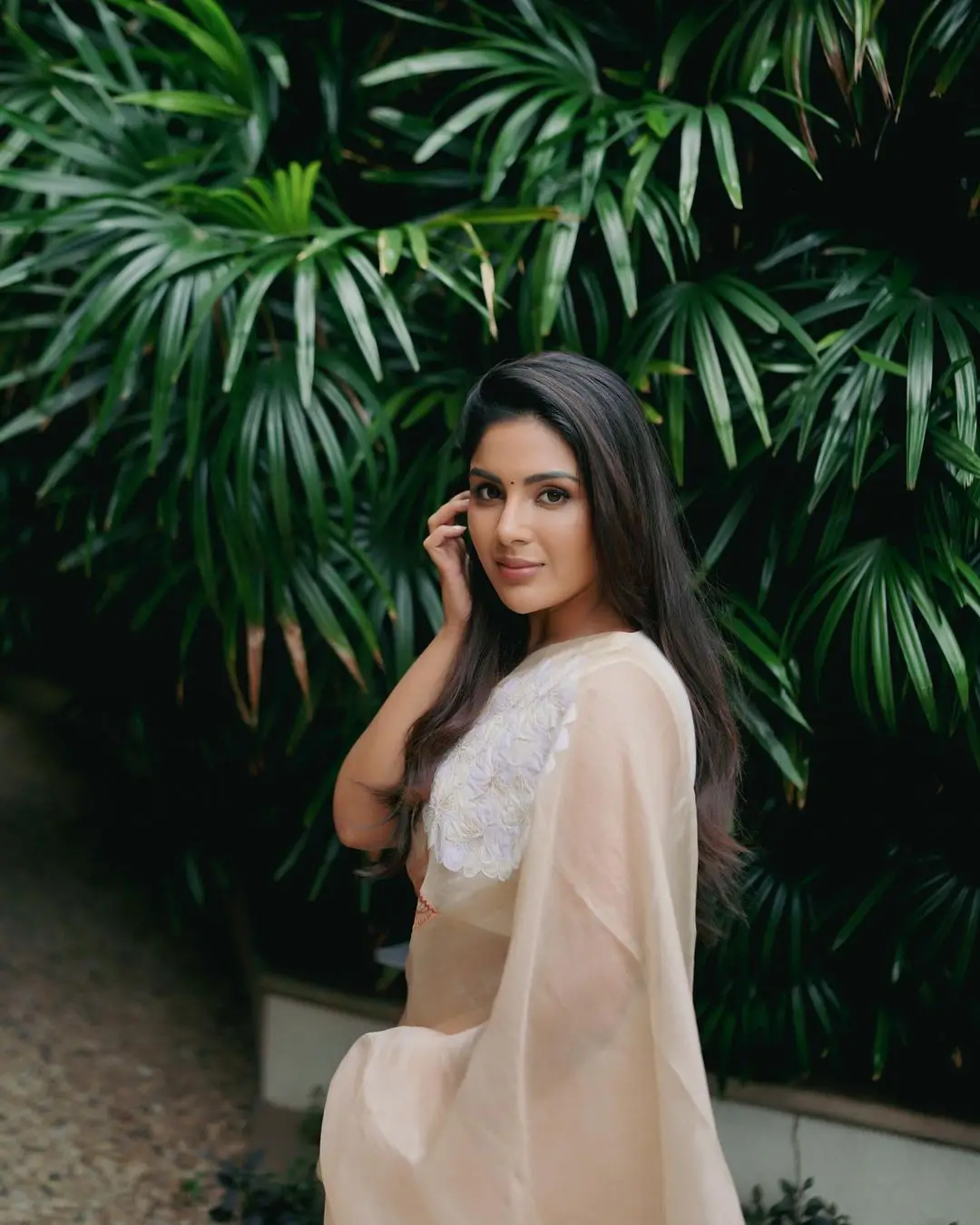 Samyuktha Menon Wearing Beautiful Earring Sleeveless White Saree